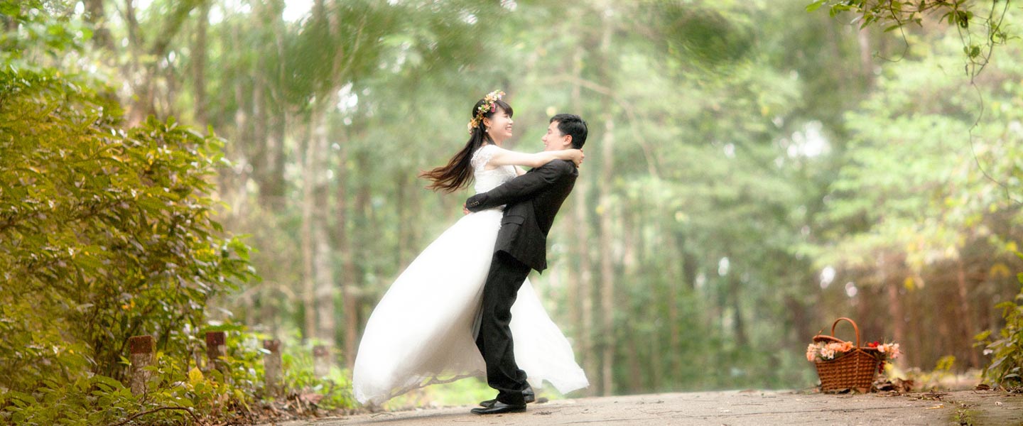 bride and groom on road to joy